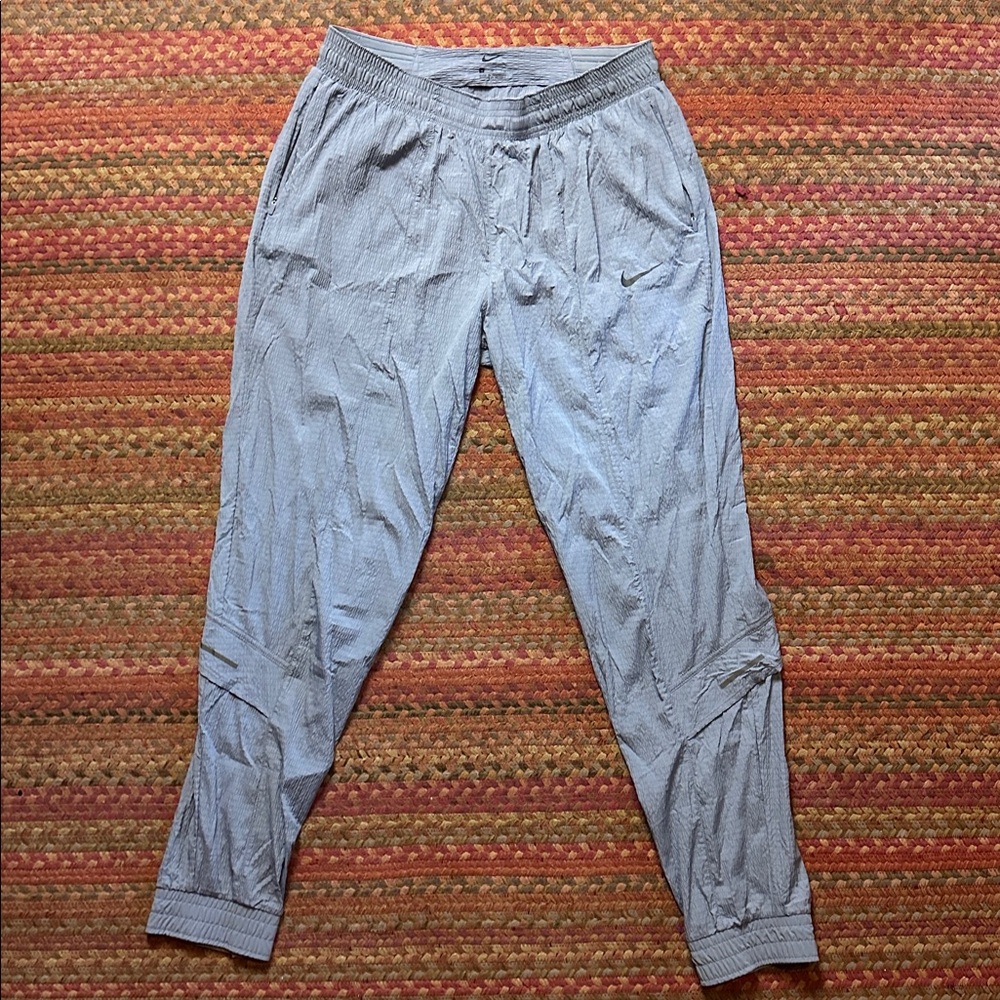 NIKE BLUE TEXTURED LIGHT WEIGHT PULL ON JOGGER PANTS